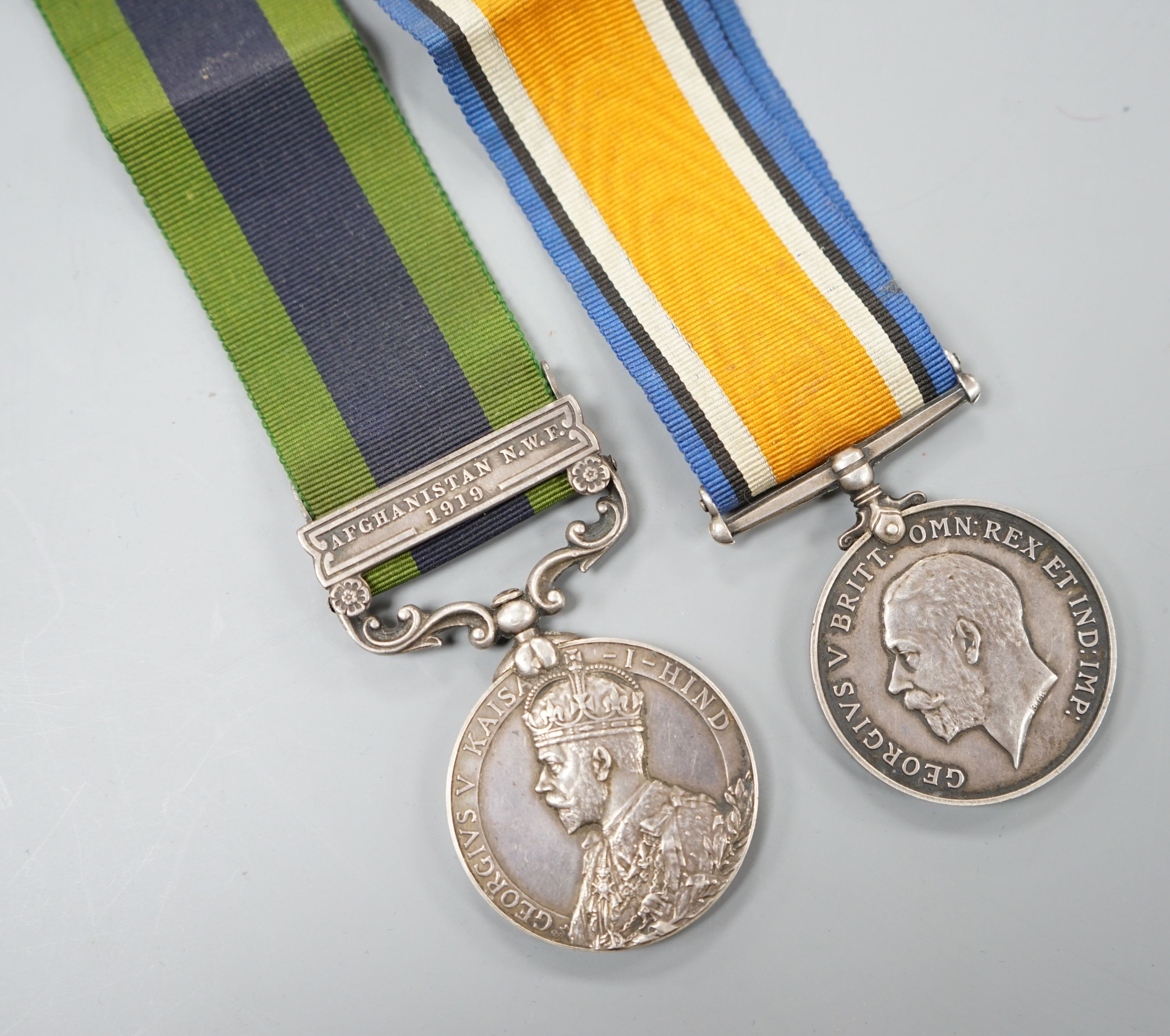 A George V IGSM with Afghanistan N.W.F. 1919 clasp and WW1 war medal to 1914 PTE. J. G. GIBBS HAMPS. R.